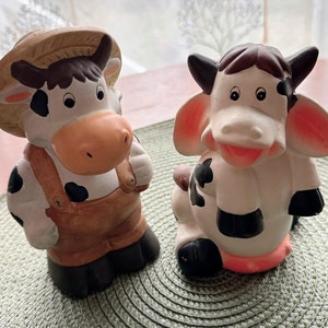 Vintage Ceramic Cow Figurines - Farmer Cow and Milking Cow Set of 2