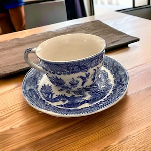 Vintage Blue Willow Tea Cup and Saucer: Classic Porcelain Set