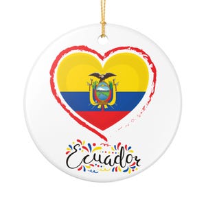 May include: A white ceramic ornament with the Ecuadorian flag in a heart shape, outlined in red. The word "Ecuador" is written in script with colourful accents. Ideal for patriotic decoration.
