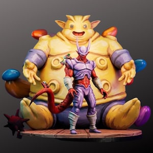 May include: A detailed figurine set featuring two fantasy characters. One is a large, yellow, smiling creature with purple accents. The other is a red and purple humanoid figure with horns and a tail. The figures are on a wooden platform.