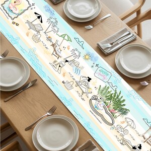 May include: A beach-themed table runner with a whimsical design. The runner features illustrations of beach scenes, including people sunbathing, palm trees, and the words "Pool Party". The color palette includes blue, yellow, and white.