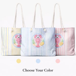 May include: Three striped tote bags in yellow, blue, and pink, each with a lobster design. The bags have white rope handles and the text "Choose Your Color" below.