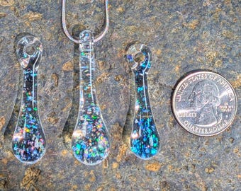 Crushed opal drop marble pendants made in borosilicate glass.  White or green opals, two sizes.  Includes 18&quot; silver chain and gift box.