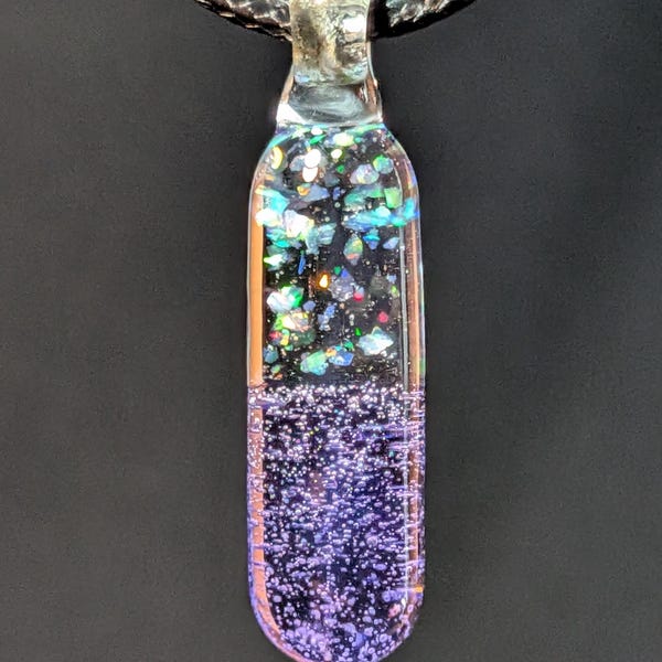 Crushed opal capsule pendant handmade from borosilicate glass. Comes with necklace and box.