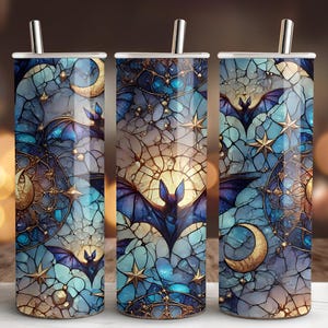 May include: Three stainless steel tumblers with a blue, gold, and black stained glass design featuring bats and moons.