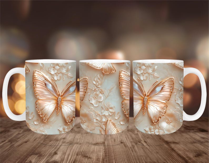 May include: Three white ceramic mugs with a repeating butterfly design. The butterflies are gold with white and blue accents, set against a cream-colored background with floral details. The mugs have white handles.