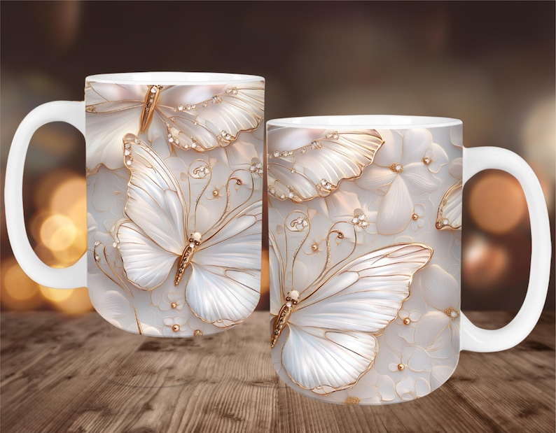 May include: White ceramic coffee mug featuring a detailed butterfly design with gold accents. The butterfly wings are white with gold trim and are set against a white floral background. The mug has a white handle.