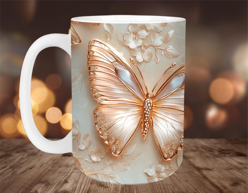 May include: White ceramic mug featuring a detailed, embossed butterfly design with gold accents and pearl-like wings. The butterfly is surrounded by floral elements on a cream-colored background. The mug has a white handle.