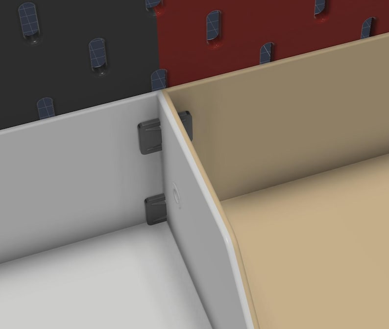 May include: A modular storage system featuring white and beige panels connected by dark gray plastic clips. The assembly is positioned in front of a dark gray and red perforated pegboard wall panel with visible slots for mounting accessories.