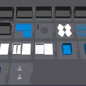 May include: A digital layout displaying various 3D printed components including black rectangular bins, blue modular connectors, white dividers, and blue storage organizers. The items are arranged in a grid on a gray workspace interface.