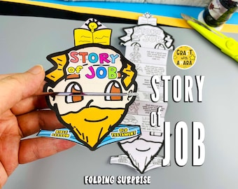 May include: A colorful paper craft featuring the text "STORY of JOB" with a cartoon illustration of a bearded man. The craft includes the words "BIBLE LESSON" and "OLD TESTAMENT". The words "FOLDING SURPRISE" are also visible.