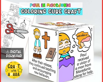 May include: A white coloring cube craft with illustrations and text about Paul in Macedonia. The cube features images of a cross, a book, and a map of Macedonia. Text includes "COLORING CUBE CRAFT" and "DIGITAL DOWNLOAD".