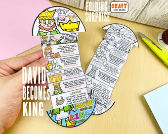 May include: A paper folding craft activity titled David Becomes King, featuring black and white illustrations of biblical scenes and text. One version is colored with markers, showing a king, a sheep, and a crown, while the other remains in black and white.
