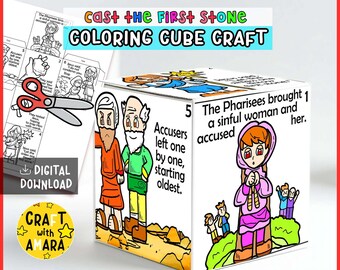 May include: A white cube craft with colourful illustrations and text. The cube features images of biblical figures and text that reads "Cast the First Stone Coloring Cube Craft." Scissors and coloring pages are also visible.