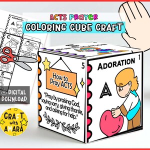 Può includere: Un cubo da colorare bianco con la scritta "ACTS PRAYER COLORING CUBE CRAFT". Il cubo presenta illustrazioni e la parola "ADORATION". È visibile anche un foglio con le istruzioni e un paio di forbici.