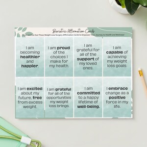 May include: A set of eight affirmation cards for weight loss surgery, with phrases like "I am becoming healthier and happier" and "I am capable of achieving my weight loss goals." The cards are light green with white text.