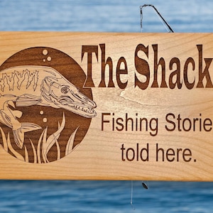 Unique, funny, fishing lover&#39;s laser engraved cabin sign, rustic alderwood plaque. The Shack decor for lake house, lodge, or man cave.
