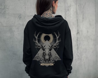 May include: Black hoodie featuring a detailed graphic of a deer skull with antlers, geometric shapes, and the text "Memento Mori." The design is in shades of gray and beige. The hoodie has a hood and a kangaroo pocket.