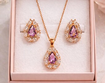 925 sterling rose gold plated silver double set with teardrop amethyst stones.