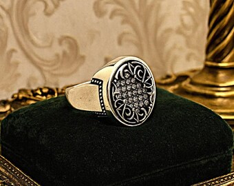 925 sterling silver rhodium plated oval men's ring with zircon stone.