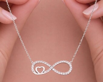 925 sterling silver rhodium plated infinity necklace in an illuminated box.