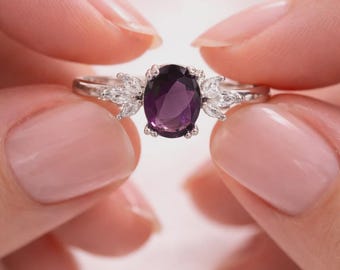 925 sterling silver rhodium plated ring with amethyst stone.