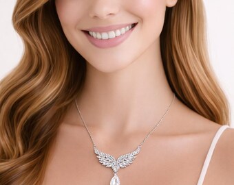 925 sterling silver angel wing necklace with teardrop zircon stones.