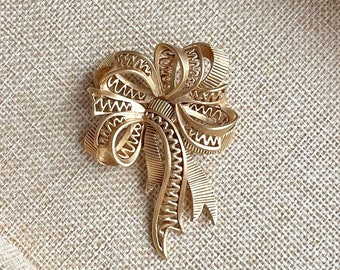 OSCAR de la RENTA Vintage lintboog driedimensionale gouden metalen broche