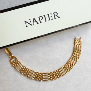 Pulsera vintage Napier de metal tono dorado con eslabones de pantera, década de 1980.