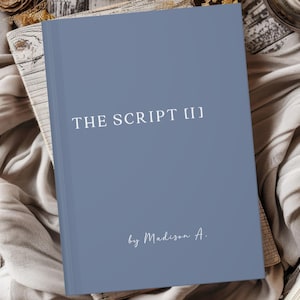 May include: A blue hardcover book with the title "THE SCRIPT [II]" and the author "by Madison A." printed in white.