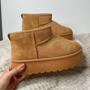 Cara shearling lace up cheap boots