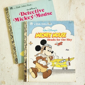Walt Disney&#39;s Mickey Mouse Little Golden Book set, Detective Mickey Mouse 1985 & Mickey Mouse Heads for the Sky 1987
