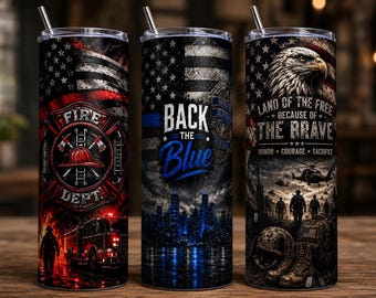 May include: Three cylindrical metal tumblers with lids and straws. The first features a red fire department emblem and truck. The second displays a blue line flag, city skyline, and the text BACK THE BLUE. The third shows an eagle, soldiers, and the text LAND OF THE FREE BECAUSE OF THE BRAVE.