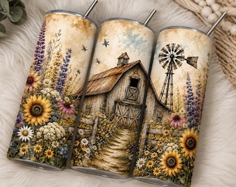 May include: Three cylindrical metal tumblers with metal straws, featuring a wrap-around print of a rustic barn, a windmill, and a field of sunflowers, lupines, and daisies in a vintage, sepia-toned color palette with a clear sky and birds.