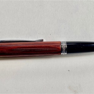 Handcrafted noble ballpoint pen made of rosewood