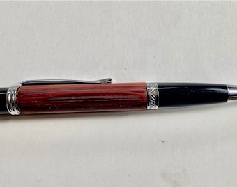 Handcrafted noble ballpoint pen made of rosewood