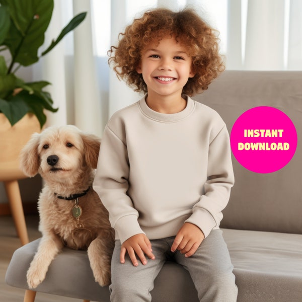 Sand sweatshirt mockup Gildan 18000B kids crewneck, smiling boy with dog beige top, shop brand promotion childrens clothing