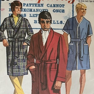 May include: Simplicity pattern 7935 for robes. The illustration shows three men wearing different robes. The robes are in various colours and patterns, including plaid and solid red. The pattern is marked "Large".