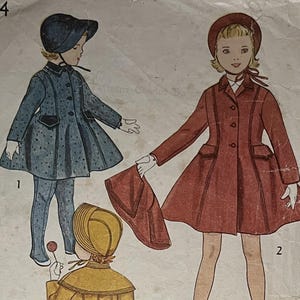 May include: Simplicity pattern 4024, size 4, showing illustrations of children's coats and outfits. The design includes a blue coat with matching trousers, a red coat, and a yellow coat. Made in Great Britain.