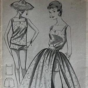 May include: Vintage sewing pattern from Weldons, featuring illustrations of a two-piece outfit and a dress. The cover has the text "WELDONS" and "FULL INSTRUCTIONS FOR MAKING INSIDE". The outfits have a polka dot pattern.