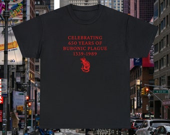 May include: Black t-shirt with red text that reads "Celebrating 650 Years of Bubonic Plague 1339-1989". A red rat illustration is below the text.