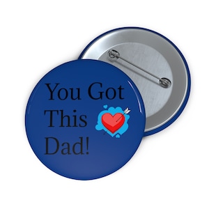 May include: Blue button with the text "You Got This Dad!" and a red heart with an arrow through it.