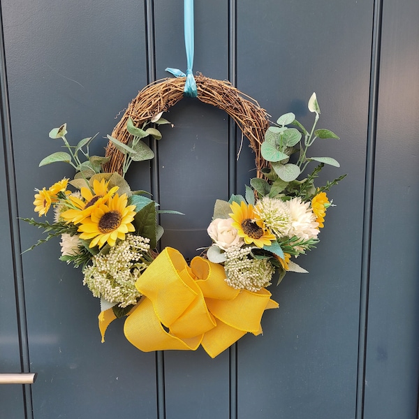 Sunflower door wreath with yellow ribbon