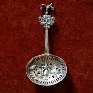 Rare Antique Dutch Silver Sugar Sifter Spoon: Girl at Well Repousse Scene