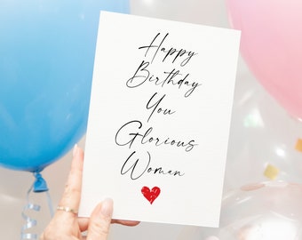 Könnte beinhalten: Eine weiße Karte mit schwarzer Kalligraphie, auf der "Happy Birthday You Glorious Woman" steht, mit einem roten Herzen unten.