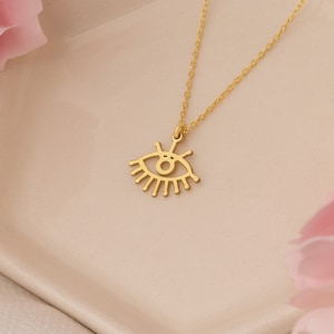 Upside down hand necklace top