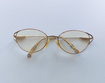 Arcenta glasses, true vintage women eyewear, work eyewear, office eyewear, read eyewear, gold frame, metal frame, metal frame, retro 81