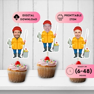 May include: Cupcakes with toppers depicting cartoon fishermen with fishing rods and fish. The toppers have different faces and wear yellow jackets and red hats. The cupcakes have pink icing and a cherry. Text reads "DIGITAL DOWNLOAD" and "PRINTABLE ITEM".