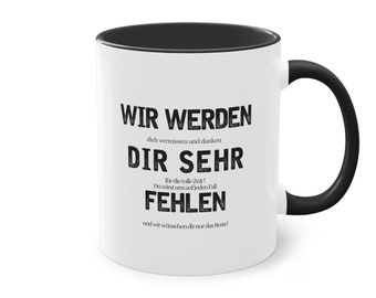 May include: White ceramic mug with a black rim and handle. The mug has black text that reads "WIR WERDEN dich vermissen und danken DIR SEHR für die tolle Zeit! Du wirst uns auf jeden Fall FEHLEN und wir wünschendirnurdas Beste!"