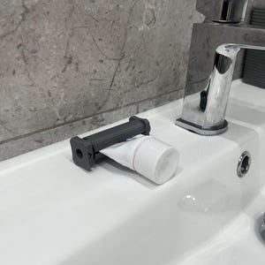 Zahnpastapresse